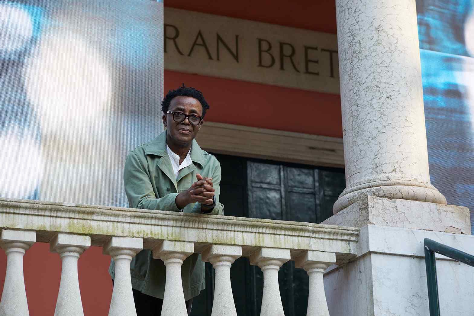 Sir John Akomfrah outside the British Pavilion 2024